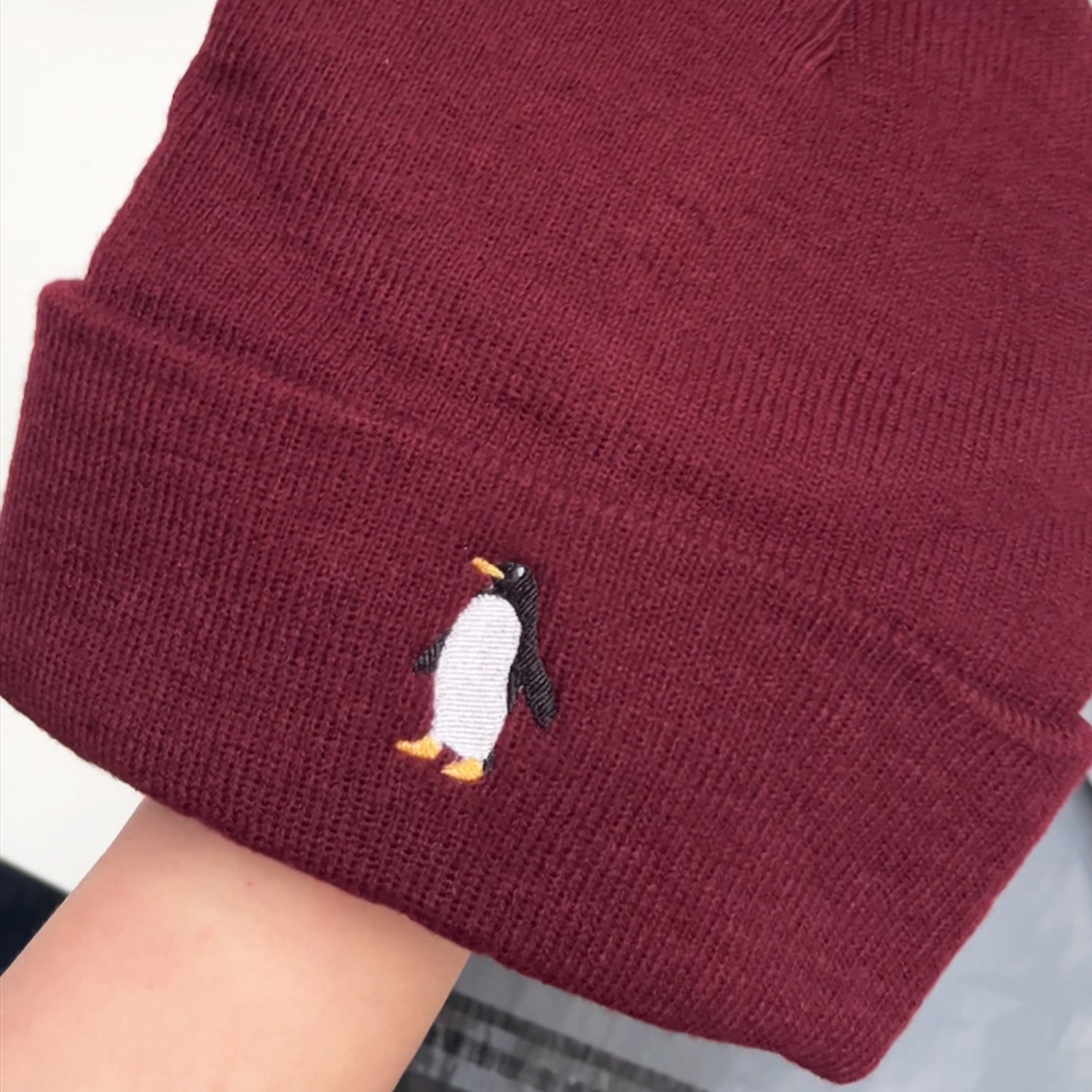 burgundy penguin